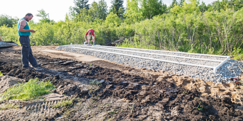 perform a drain field installation as part of their drain field services